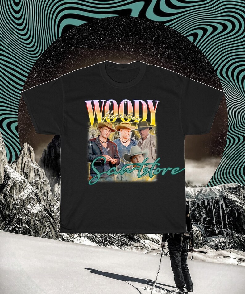 May include: Black t-shirt with a vintage-style graphic of a band called "Woody Santstore". The graphic features four men wearing cowboy hats and vests.
