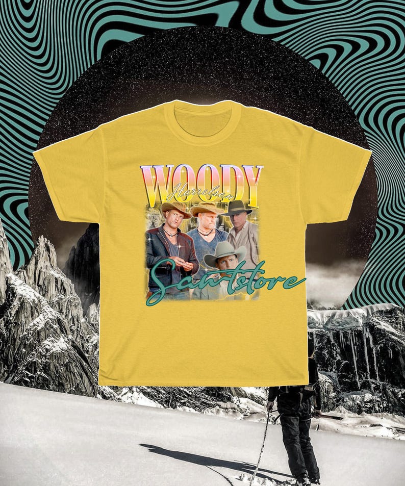 May include: Yellow t-shirt with a vintage-style graphic of four men wearing cowboy hats and the text "Woody Apparel &  Santorstore".