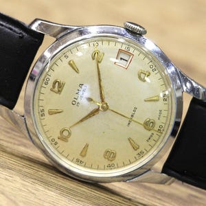 Olma swiss watch - Etsy 日本
