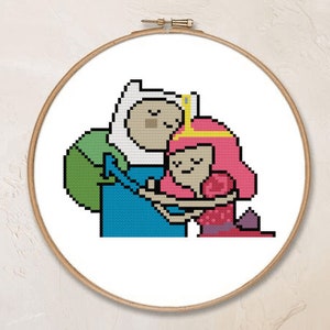 May include: Cross-stitch pattern featuring Finn the Human and Princess Bubblegum from the animated series Adventure Time. Finn is wearing his signature blue and green outfit, while Bubblegum is wearing her pink dress and crown. The two characters are hugging each other.