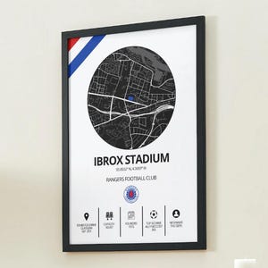 May include: Framed print featuring a black and white map of Ibrox Stadium, with the text "IBROX STADIUM" and "RANGERS FOOTBALL CLUB". The print has a black frame and a small section with red, white, and blue stripes.