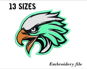 May include: Green, white, and orange embroidered design of an eagle's head with the text "13 SIZES" above it. Embroidery file.