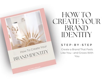 May include: A book titled "How To Create Your Brand Identity" with a pink cover and a photograph of wheat stalks in a vase. The text "How To Create Your Brand Identity" is displayed on the cover. The book is angled on a white background.