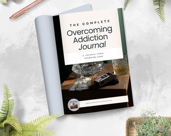 May include: A magazine cover with the title "The Complete Overcoming Addiction Journal" by Kimberley Lowe. The cover features a photo of a glass of whiskey, a pack of cigarettes, and money on a wooden table.