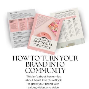 May include: A stack of three pink and white documents with text. The central document reads "How to Turn Your Brand Into a Community." The image includes a keyboard, a floral notebook, and a pink coaster.