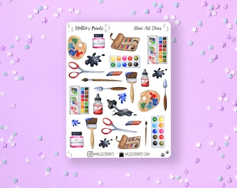 May include: A sheet of stickers featuring watercolor illustrations of art supplies, including paintbrushes, paint palettes, paint tubes, and watercolor palettes. The stickers are white with black outlines and are arranged in a grid pattern. The text "Mini Art Class" is at the top of the sheet. The text "Millie's Prints" is at the top left of the sheet.