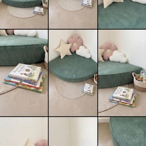 May include: A children's reading corner with a green corduroy corner bench. The scene includes star, flower, and cloud-shaped cushions. A stack of books and a small rug are also present, creating a comfortable reading area. The bench is approximately 100cm x 100cm.
