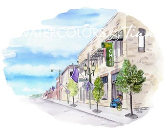 May include: Watercolor painting of a street scene featuring a building with a sign that reads "The Chef." The artwork includes a blue sky, flags, trees, and a sidewalk. The artist's signature is visible.