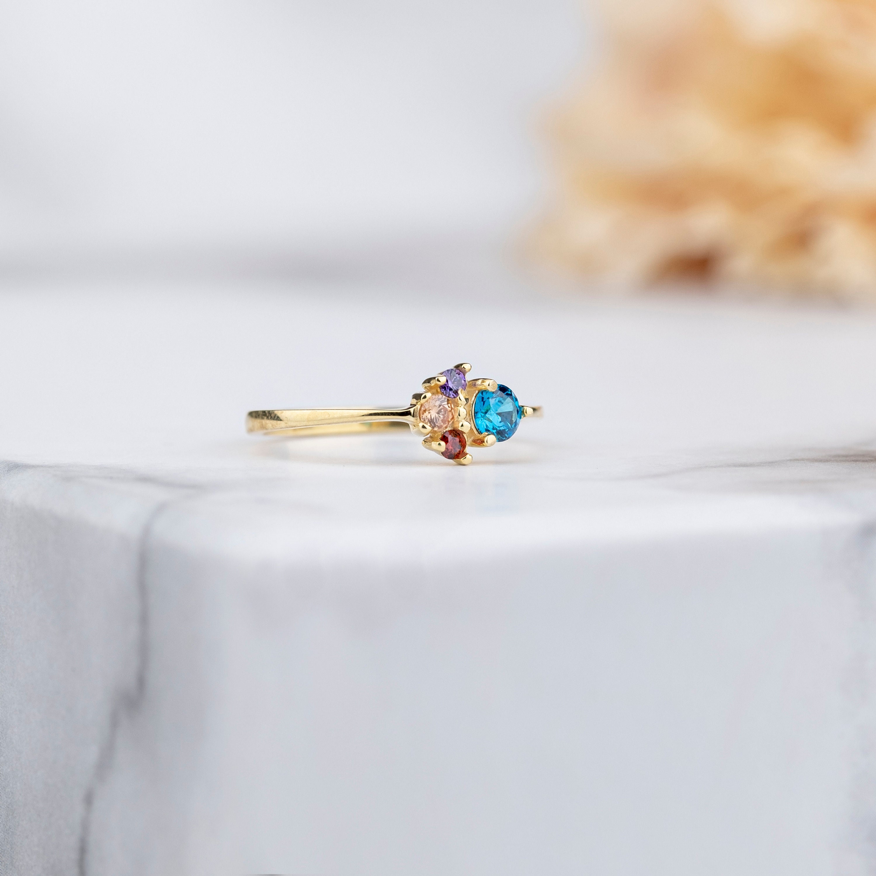 Bague familiale 4 pierres new arrivals