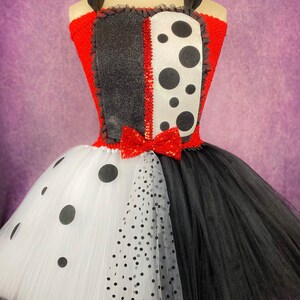 Costume Lovers 🌕 — Cruella De Vil (Emma Stone) Red dress.. Cruella
