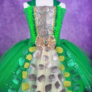 May include: A set of three ceramic mugs with a speckled, matte finish. Each mug features a different color: light blue, cream, and gray. The mugs have a simple, modern design with a rounded shape and a comfortable handle.