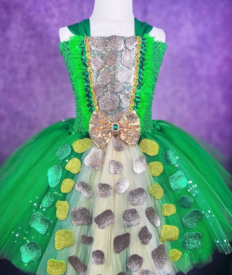 May include: A set of three ceramic mugs with a speckled, matte finish. Each mug features a different color: light blue, cream, and gray. The mugs have a simple, modern design with a rounded shape and a comfortable handle.