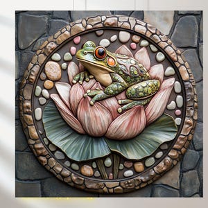 May include: A green frog with red eyes sits on a pink and white lotus flower. The flower is surrounded by brown, green, and white stones. The image is framed by a brown, circular border.
