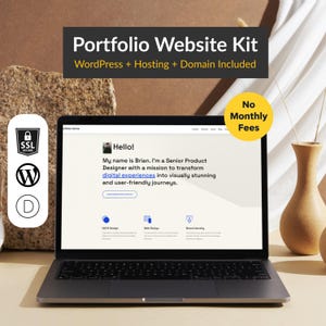 May include: A laptop displaying a website design, with the text "Portfolio Website Kit" and "WordPress + Hosting + Domain Included." The screen shows a "Hello!" message and the words "digital experiences." A "No Monthly Fees" sticker is visible.