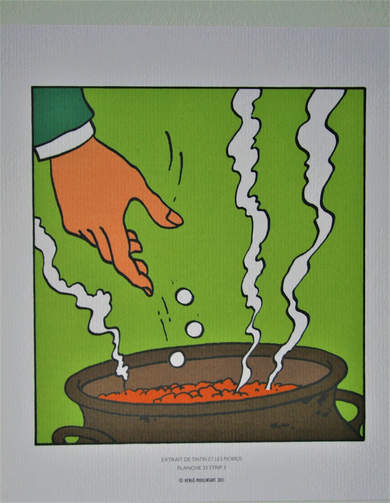 May include: A hand drops three white balls into a brown pot with orange liquid and steam rising from the pot. The background is green. The text at the bottom reads "Extrait de Tintin et les Picards, Planche 33 Strip 3, &copy; Herg&eacute; Moulinsart 2011."