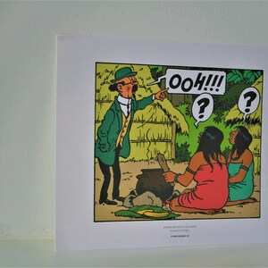 May include: A black and white comic book illustration of a man in a green jacket and a hat pointing at two women in a jungle setting. The man is saying "ooh!!!" and the women are looking at each other with question marks above their heads. The text "EXTREIT DE "LA VALLEE DES TIGRES" PLANCHE 20" is at the bottom of the image.