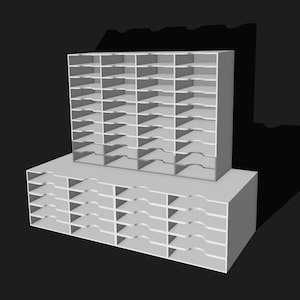 May include: A two-tiered, white, modular storage unit with multiple compartments. The top unit has a grid of small, square openings, while the bottom unit has a series of wider, curved openings. The units are designed to be stacked.