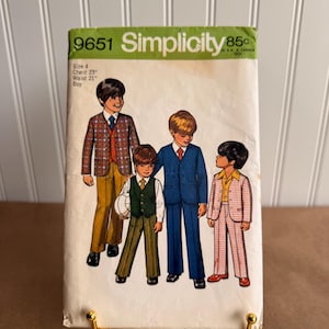 May include: Simplicity sewing pattern 9651 for size 4, chest 23 inches, waist 21 inches. The envelope features an illustration of four children wearing various formal suits, including plaid jackets, vests, and trousers in blue, brown, and tan.