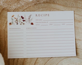 May include: A white recipe card with a floral design and the text "RECIPE" in brown lettering. The card has sections for "dish name", "from the kitchen of", "serves", "prep", "cook", "ingredients", and "directions".