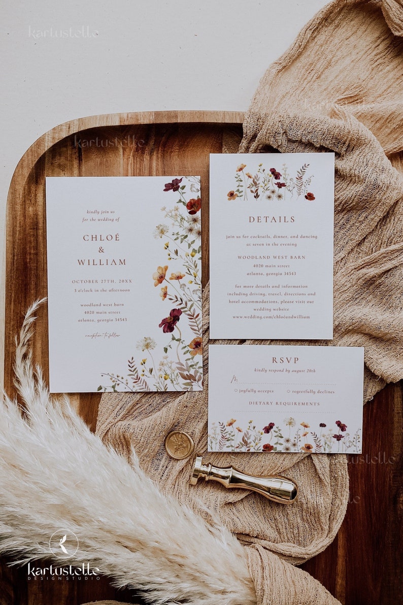 May include: A wedding invitation suite with a floral design. The invitation features the names Chloe & William, the date October 27th, 20XX, and the time 3 o'clock in the afternoon. The details card includes the location Woodland West Barn, 4020 Main Street, Atlanta, Georgia 14541. The RSVP card has a floral design and the text "kindly respond by August 20th".