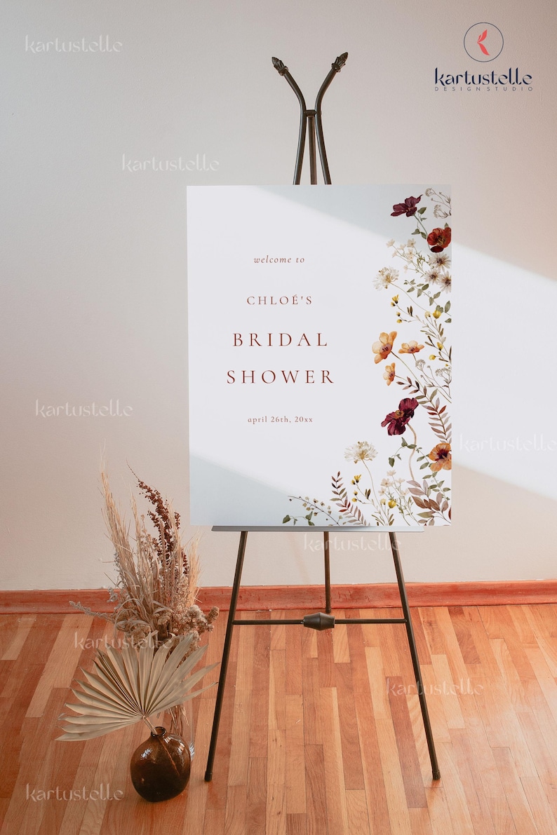 Może przedstawiać: Biały znak z kwiatowym wzorem po prawej stronie. Znak głosi "welcome to CHLOE'S BRIDAL SHOWER april 26th, 20xx". Znak stoi na sztaludze.