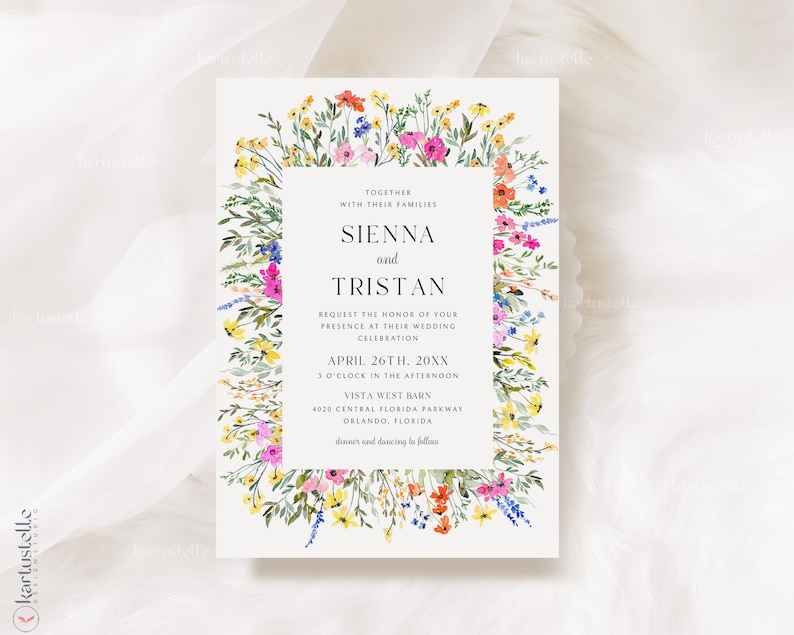 May include: Wedding invitation featuring a floral border with colorful wildflowers in shades of pink, yellow, blue, and orange. The invitation has a rectangular text box with the names "Sienna and Tristan" and event details.