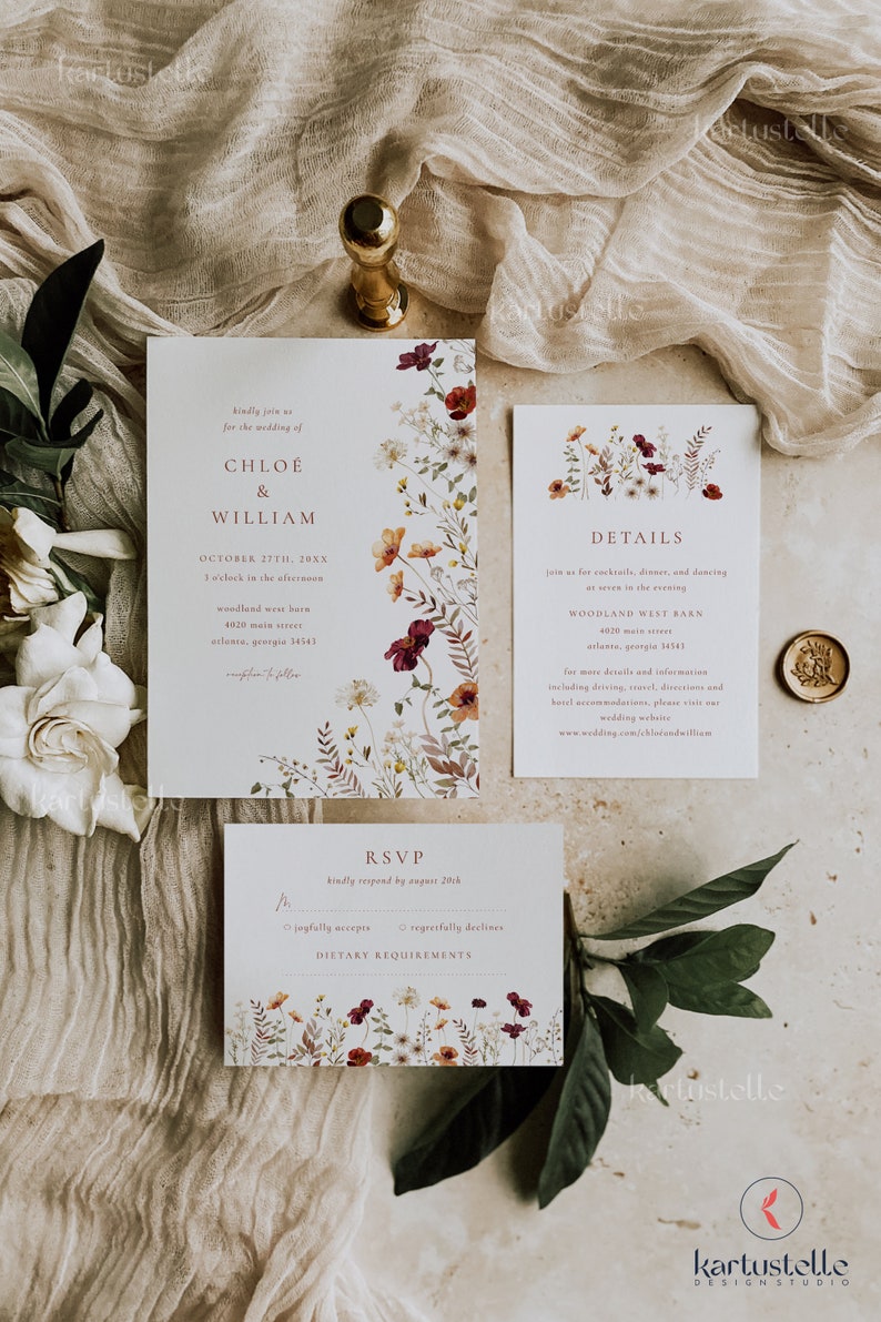 May include: Wedding invitation suite with floral designs in shades of burgundy, red, and white. The invitation card features the text "kindly join us for the wedding of CHLO&Eacute; & WILLIAM" and the date "OCTOBER 27TH, 20XX". The details card includes the time and location of the wedding reception. The RSVP card has a floral design and the text "kindly respond by August 20th".