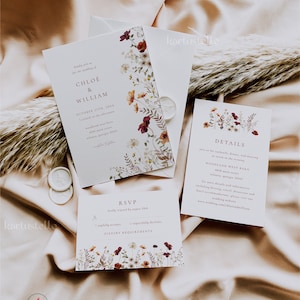May include: A wedding invitation suite with a floral design. The invitation features a white background with burgundy and orange flowers. The RSVP card has a similar design and includes a section for dietary requirements. The details card has a white background with a floral design and includes the wedding date, time, and location.