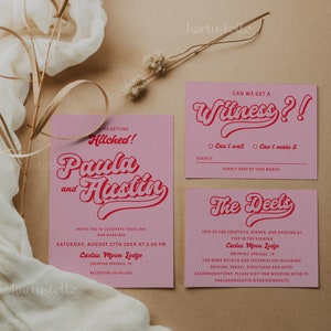May include: Pink and red wedding invitation with the text "Hitched! Paula and Austin" in a retro font. The invitation includes the date, time, and location of the wedding ceremony and reception at Cactus Moon Lodge in Dripping Springs, Texas. A separate pink and red card with the text "Can we get a Witness?!" includes options for guests to RSVP.
