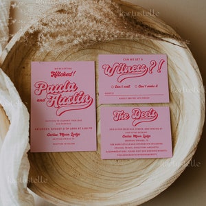 May include: Pink and red wedding invitation cards with a retro font. The cards announce the wedding of Paula and Austin, and include the date, time, and location of the ceremony and reception. The cards also include a RSVP card with the text "Can we get a witness?" and a card with the text "The Deets" that includes details about the wedding.