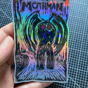 MOTHMAN LIVES holographic sticker