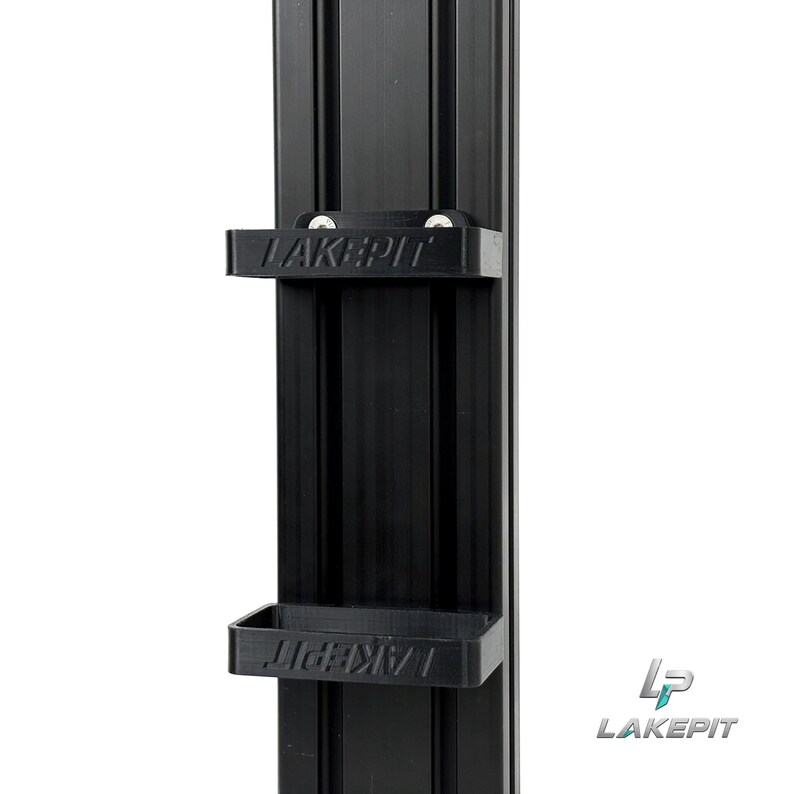 May include: A black vertical aluminum extrusion profile featuring two attached black plastic brackets. Each bracket is embossed with the text LAKEPIT and is secured to the central channel of the extrusion with two visible silver metal screws.