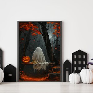 May include: A framed Halloween-themed print depicts a ghost on a swing in a spooky forest, with a carved pumpkin and fall foliage. Decorative pumpkins, black houses, and a witch hat complete the seasonal display.