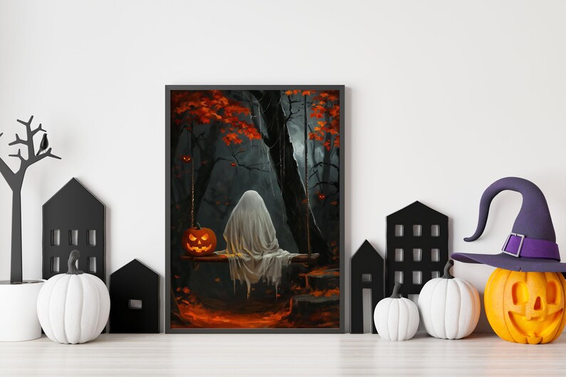 May include: A framed Halloween-themed print depicts a ghost on a swing in a spooky forest, with a carved pumpkin and fall foliage. Decorative pumpkins, black houses, and a witch hat complete the seasonal display.