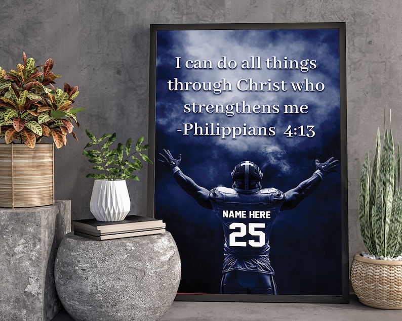 May include: A motivational quote from Philippians 4:13, "I can do all things through Christ who strengthens me", is displayed on a blue and white poster with a football player in the background. The player is wearing a blue jersey with the number 25 and the words "NAME HERE" above the number.