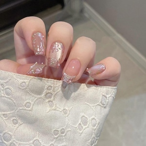 Unhas de pressão artísticas com magnólia de primavera | Unhas com pétalas de flores | Unhas reutilizáveis com design artístico | Unhas postiças charmosas | Unhas caixão premium | Unhas de gel para manicure