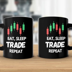 May include: Two black mugs with white text and a green and red candlestick chart graphic. The text on the mugs reads "Eat, Sleep, Trade, Repeat".
