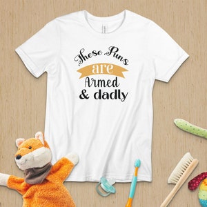 These puns are armed & dadly-01 Wear Your Sense of Humor with Our Pun-tastic T Shirt, Crewneck, Sweatshirt, or Hoodie, Funny Shirt