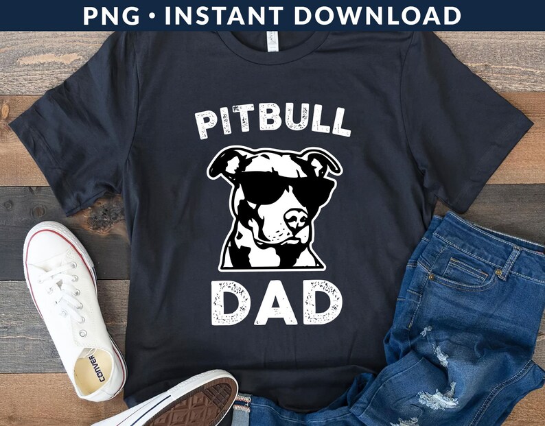 May include: Black t-shirt with a white graphic of a pitbull wearing sunglasses and the text "Pitbull Dad".