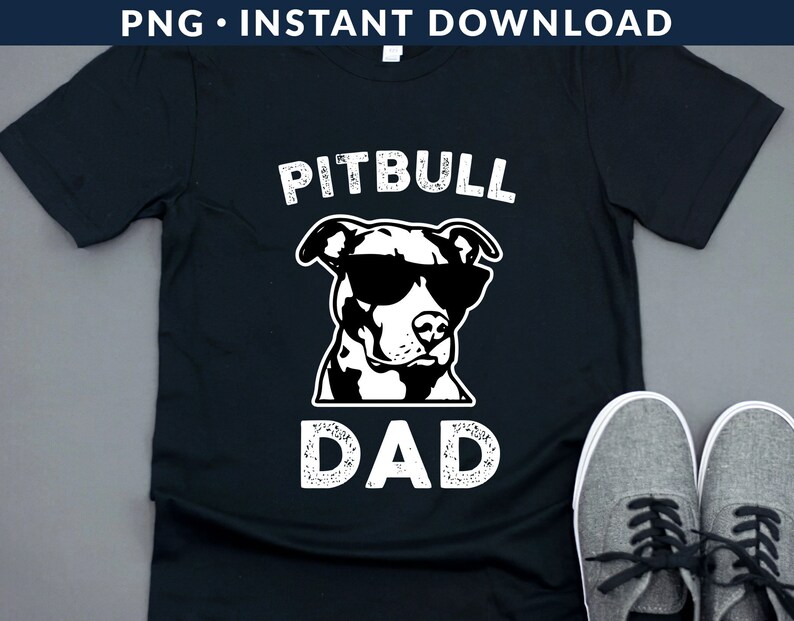 May include: Black t-shirt with a white graphic of a pitbull wearing sunglasses and the text "Pitbull Dad".