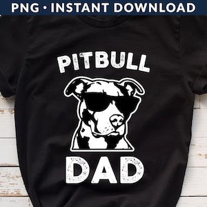 May include: Black t-shirt with white text that says "Pitbull Dad" and a graphic of a pitbull wearing sunglasses.