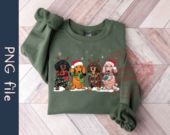 Puede incluir: Una sudadera verde con un diseño navideño con cuatro perros salchicha que llevan gorros de Papá Noel y luces de Navidad. Los perros están de pie en fila y tienen expresiones festivas en sus caras.