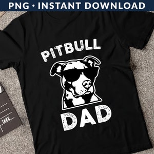 May include: Black t-shirt with a white graphic of a pitbull wearing sunglasses and the text "Pitbull Dad".