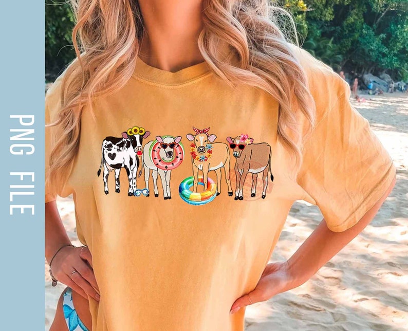 May include: A yellow t-shirt with a graphic of four cows wearing sunglasses and flower crowns. The cows are standing in a line and one is holding a rainbow float.