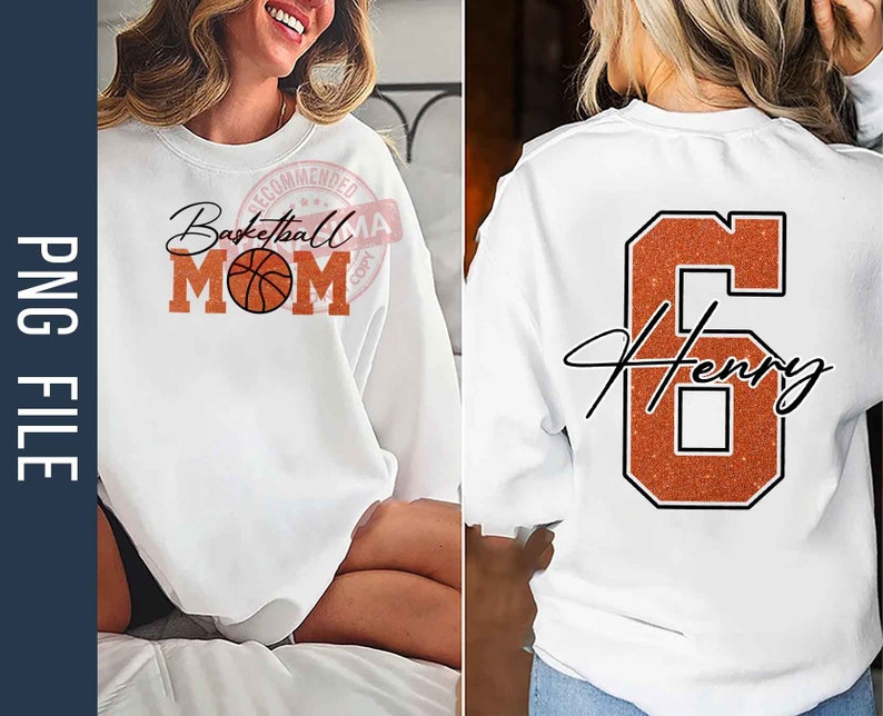 May include: White sweatshirt with the text "Basketball Mom" and a basketball graphic on the front. The back of the sweatshirt has a large orange number 6 with the name "Henry" written in cursive.