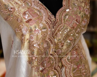Hand beaded cut dana work pure gold Kanjivaram embellished Saree: party heavy Wedding Saree