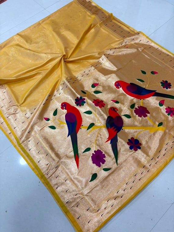 Banarasi muniya border kanjivaram fusion peacock motifs wedding haldi yellow saree