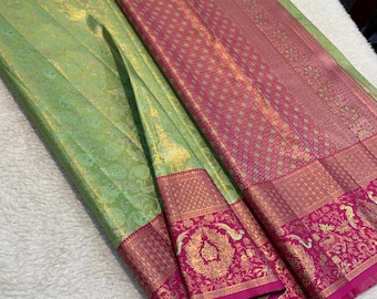 Mint Green Floral Brocade Silk Saree | Magenta Peacock Border, Gold Zari Indian Wedding Wear