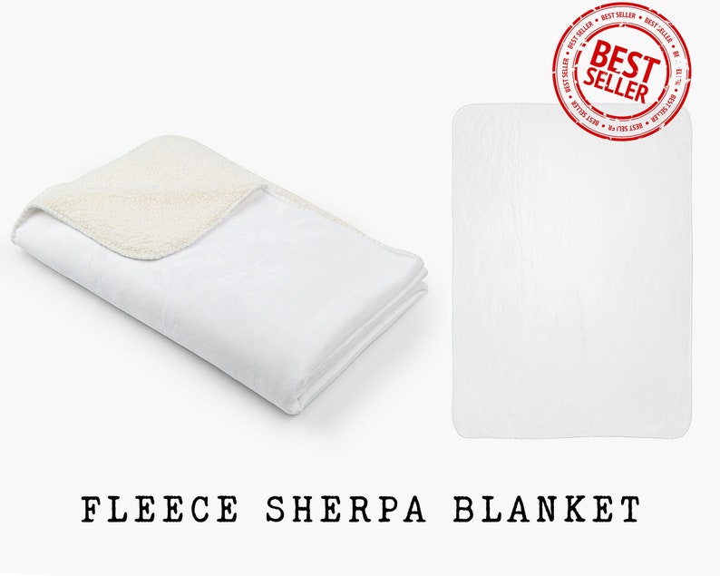 May include: A white fleece sherpa blanket folded in half. The blanket has a soft, plush texture and is perfect for cuddling up on the couch.