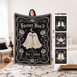 May include: A black and cream woven throw blanket featuring two ghosts, roses, spiderwebs, and the text Forever Boo'd, Ava, Ethan, and Est. 2025. The design includes three additional variations showing different ghost illustrations and names.